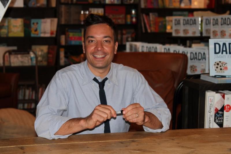 Jimmy Fallon signs Your Babies First Words Will Be Dada" at Harbor Books in Sag Harbor on June 20, 2015.