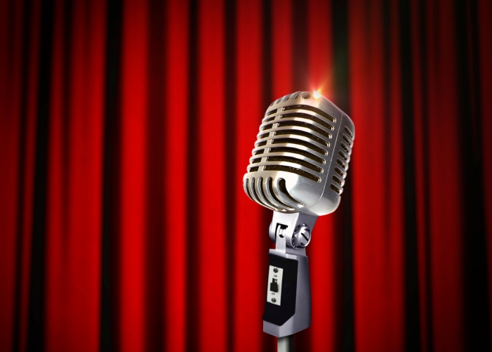 Vintage Microphone over Red Curtains live events