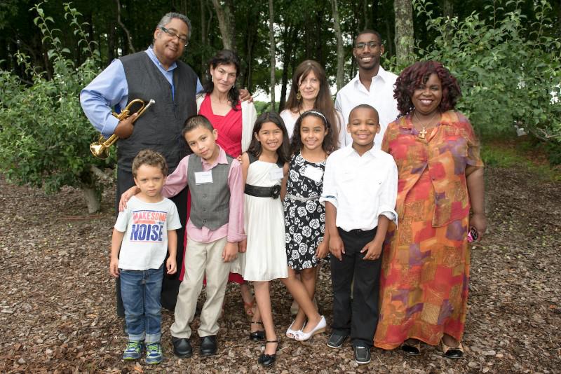 Jazz great Jon Faddis with Kayce Freed and Bridggehampton Child Care & Recreation Center teachers Susan Lazarus Reiman and James Coeell with children from the program.