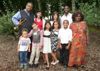 Jazz great Jon Faddis with Kayce Freed and Bridggehampton Child Care & Recreation Center teachers Susan Lazarus Reiman and James Coeell with children from the program.