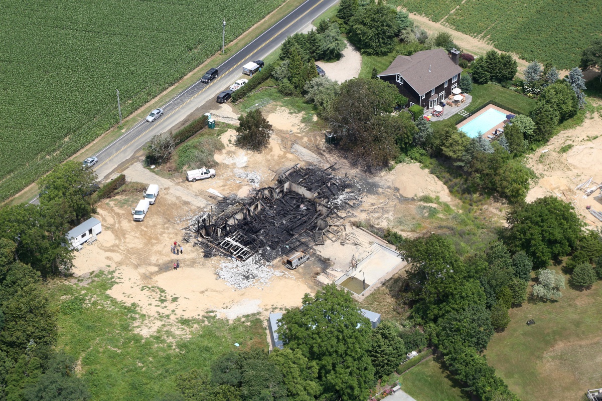 A fire completely destroyed a Hamptons mansion at Seven Ponds Road in Water Mill. Photo credit: Cully/EEFAS