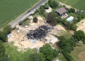 A fire completely destroyed a Hamptons mansion at Seven Ponds Road in Water Mill. Photo credit: Cully/EEFAS