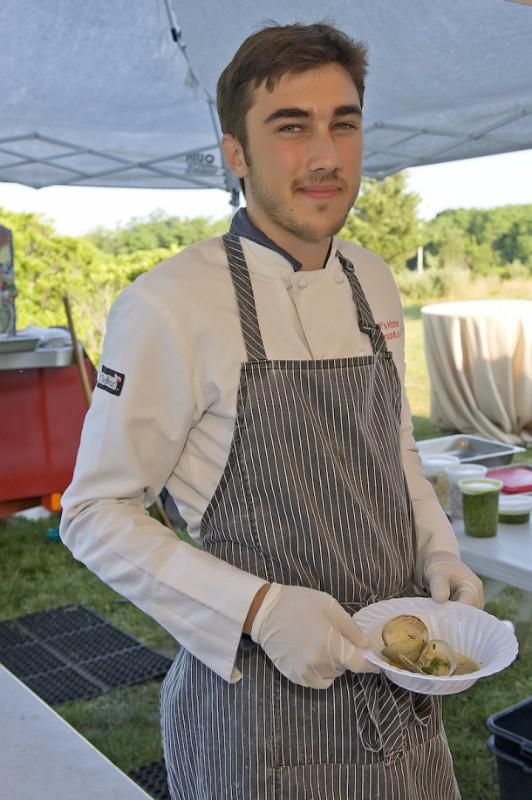 Oskar Golden helped work the Hayground School oven, offering baked clams in their shells.