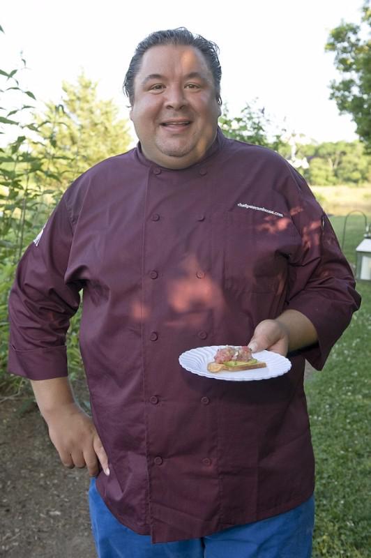 Chef Peter Ambrose, sampling another chef's hors d'oeuvre.