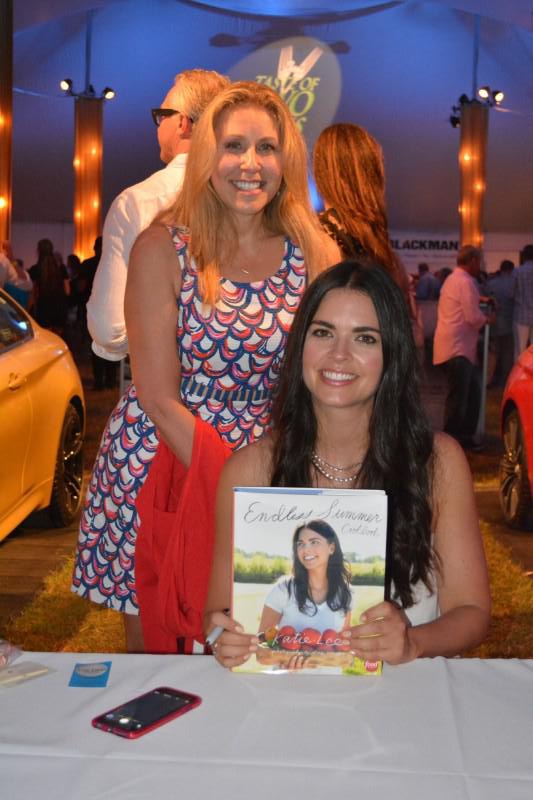 Katie Lee poses with fans