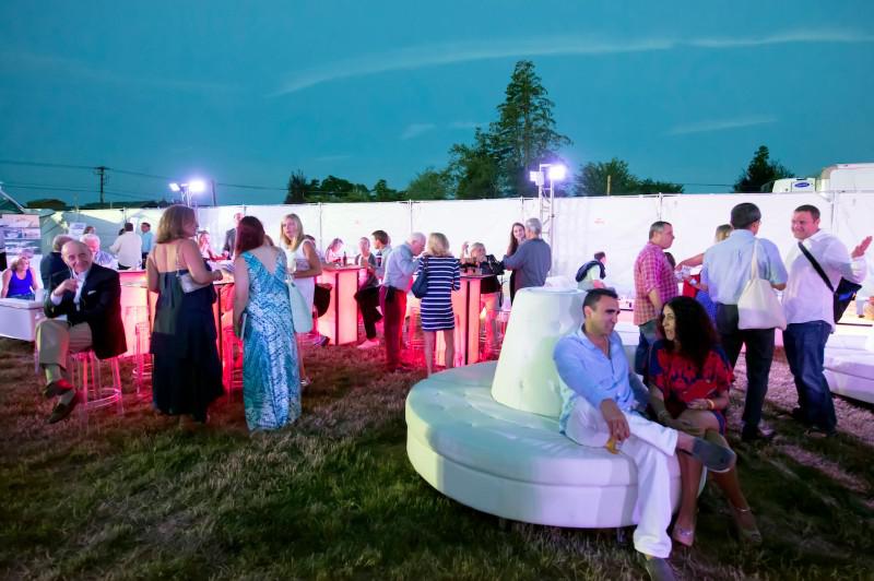As the evening light deepened and the party light came up the crowd of foodies filled the tent and outdoor seating are.