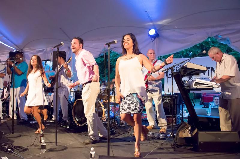 The nine-member band Just Groovin' kept the dance music non-stop as a perfect compliment to the eat, drink and repeat of this year's Taste of Two Forks.