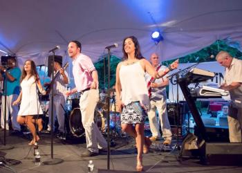 The nine-member band Just Groovin' kept the dance music non-stop as a perfect compliment to the eat, drink and repeat of this year's Taste of Two Forks.
