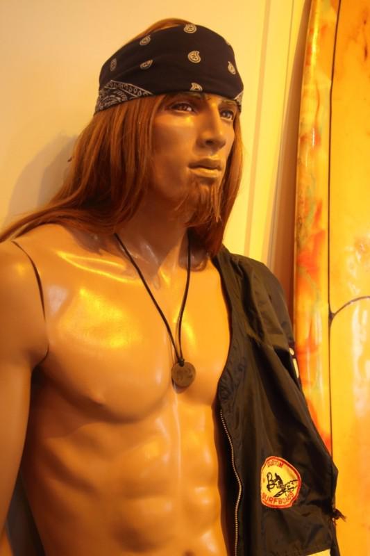 Medallions worn by surfers to show they had registered with the town