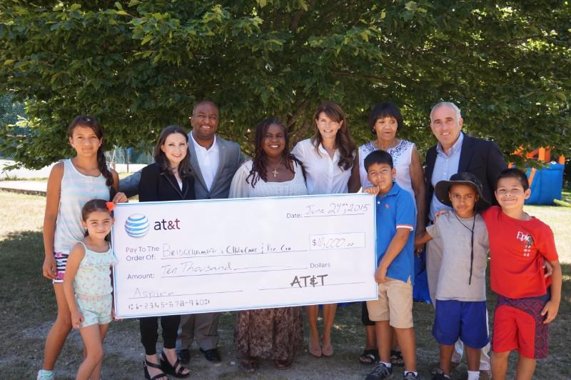 AT&T's Marissa Shorenstein and Brandon V. Ray, Bonnie Michelle Cannon, Southampton Town Supervisor Anna Throne-Holst, Board Member Gloria Harris, Suffolk County Legislator Jay Schneiderman and BCC&RC kids.