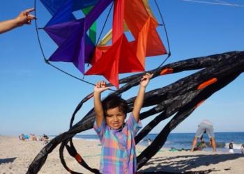 Kalu Zuniga who won the prize for the biggest kite, the octopus behind him 