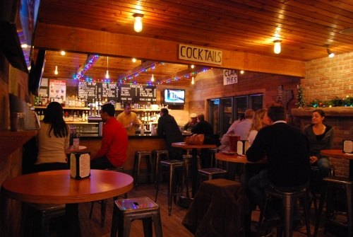 A rustic and warm atmosphere await patrons of Townline BBQ.