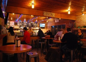 A rustic and warm atmosphere await patrons of Townline BBQ.
