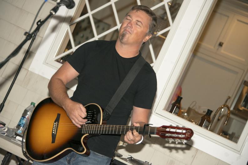 Musician Edwin McCain performed for the guests at the Tic Toc Stop fundraiser, Hanging in the Hamptons
