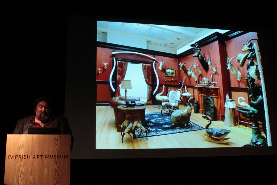 Artist Michael Combs with one of his "Man Cave" installations