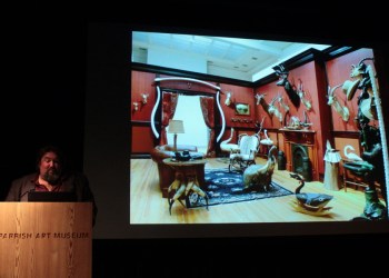 Artist Michael Combs with one of his 