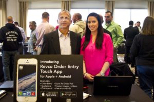 Revco Vice President Michael Velys and Lisa Darrow at Revco's Energy Efficiency Trade Show at the Long Island Aquarium in Riverhead.