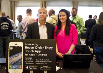 Revco Vice President Michael Velys and Lisa Darrow at Revco's Energy Efficiency Trade Show at the Long Island Aquarium in Riverhead.