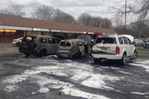 The middle vehicle caught fire and the two adjacent vehicles were also destroyed as a result.