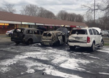 The middle vehicle caught fire and the two adjacent vehicles were also destroyed as a result.