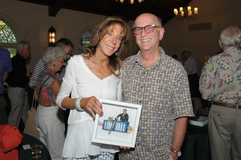 Artist Christa Maiwald with her "Cat Trick" and her husband Mark Segal