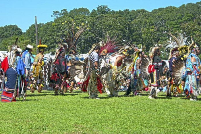 The drums intensify as the dancers begin the Grand Entry at the 2015 Shinnecock Powwow.
