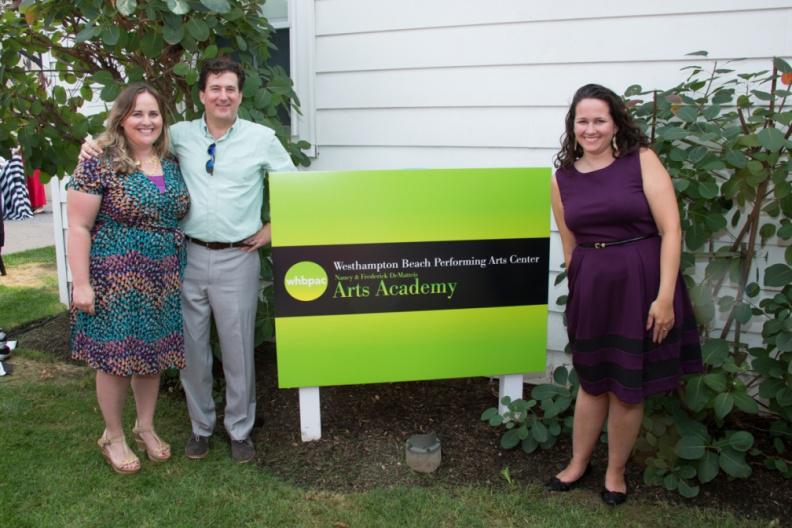 WHBPAC Director of Arts Education Julienne Penza Boone, Executive Director James Burke, and Marissa Russo, the WHBPAC arts education manager, unveil the new logo for the Nancy and Frederick DeMatteis Art Academy