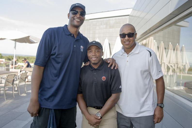 Knicks ambassador John Wallace, Director of Fan Development Chris Jean and Knicks ambassador John Starks.