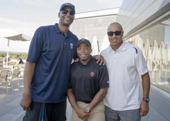 Knicks ambassador John Wallace, Director of Fan Development Chris Jean and Knicks ambassador John Starks.