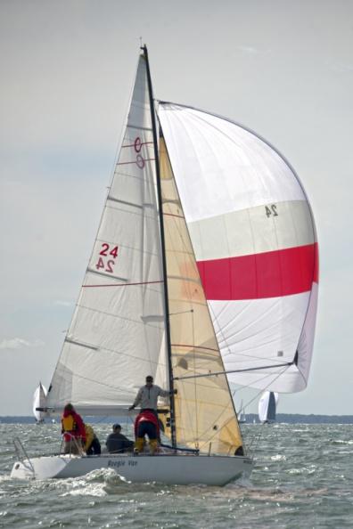 Boogie Van just snapped open their spinnaker after rounding the half-way marker at Crow Shoals buoy.