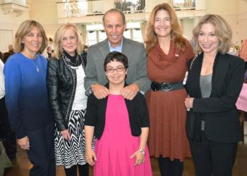 IGHL board member Donna LoDuca, board member Bernadette Zimmermann, CEO Walter Stockton, Treasurer Janet Fernandez and board member Nella Hahn with IGHL consumer 
