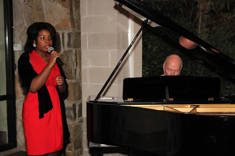 East End Arts Event Coordinator Sherree Elder sings "Somewhere Over the Rainbow"