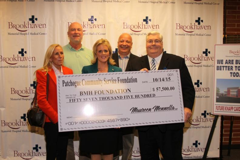 Michele Knapp, David Knapp, Maureen Mennella, President of the Rotary Club of Patchogue and Harbor Crab co-owner Brian Kearns, Brookhaven Memorial Hospital Medical Center President and CEO Richard Margulis