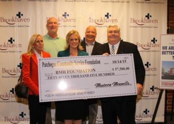 Michele Knapp, David Knapp, Maureen Mennella, President of the Rotary Club of Patchogue and Harbor Crab co-owner Brian Kearns, Brookhaven Memorial Hospital Medical Center President and CEO Richard Margulis