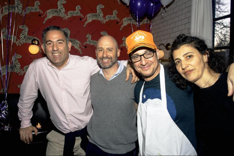 Almond co-owner Eric Lemonides with long-time friend and photographer Eric Striffler, Executive Chef Jason Weiner and the restaurant's ever lovely namesake, Almond Zigmund