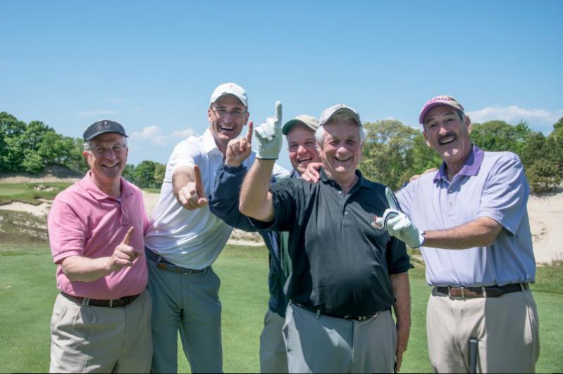Len Gallo, Stephen Athan, caddy Ryan, Sandy Schoenbach who made an ace on the par 3, 17th from 145 yards and Donny Poe