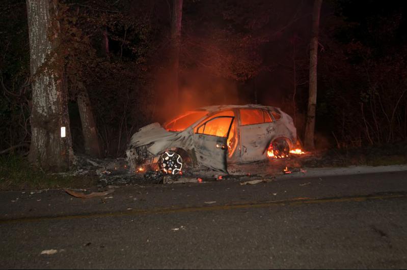 This car was found ablaze after hitting a tree on Northwest Road shortly after midnight in East Hampton on Monday, September 19
