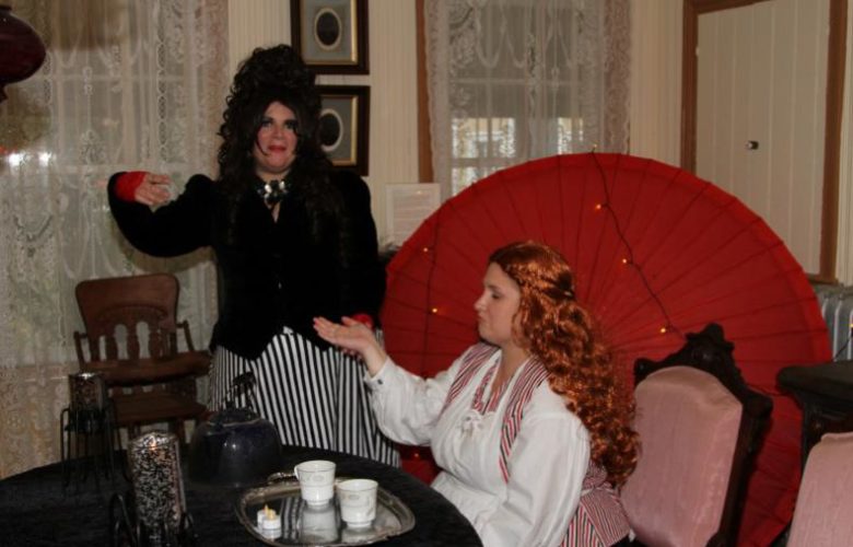 Colette Gilbert as Madam Zoloft with Rebekah White as Katie