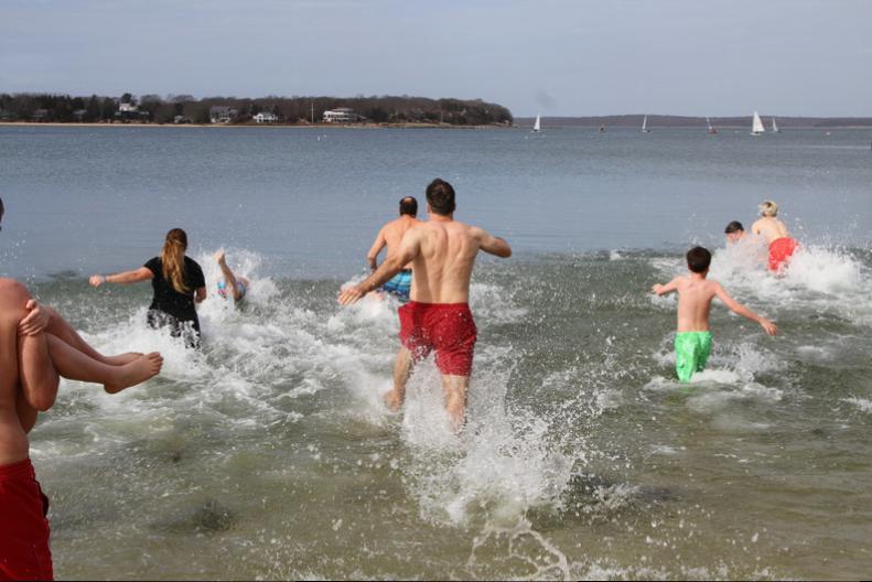 Participants ran into the cold water at the Polar Plunge