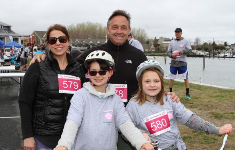 Laura and John Smith with 9-year-old Alaia and Serene