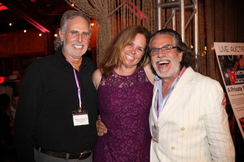 Steven J Bergerson, past president of The Retreat Nicole Behrens, and current president Richard Demato of RJD Gallery