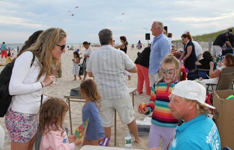Children lined up to have their faces painted by Party Kidz
