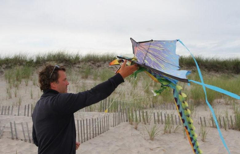 Jeff Chmielewski prepares his kite for takeoff