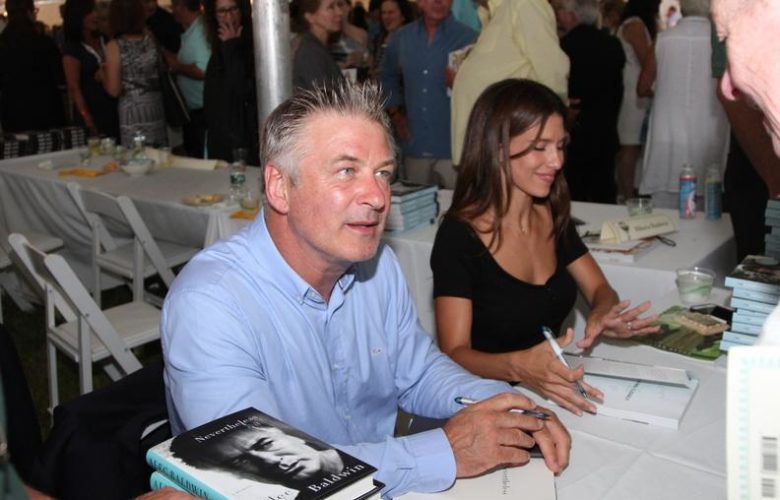 Alec and Hilaria Baldwin sign books