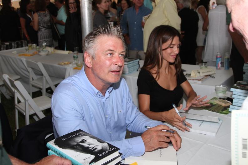 Alec and Hilaria Baldwin sign books