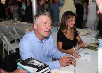 Alec and Hilaria Baldwin sign books