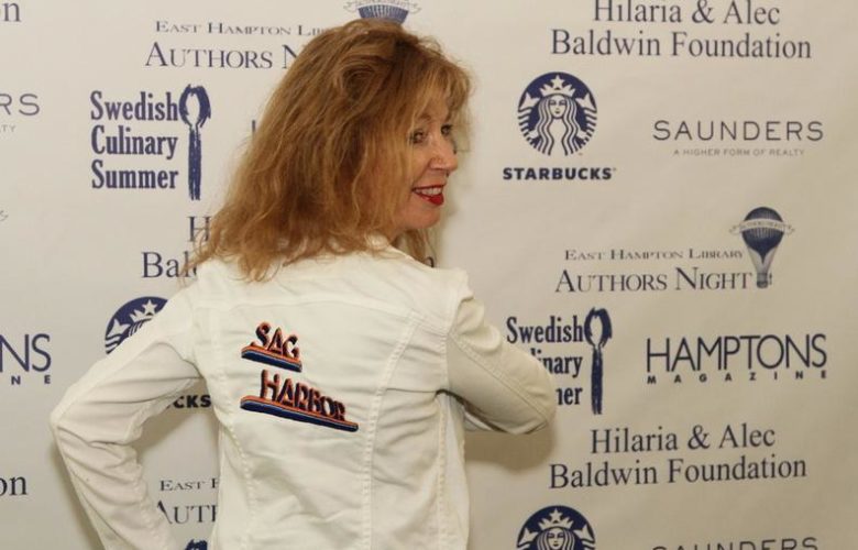 April Gornik shows off her Sag Harbor Cinema sign jacket