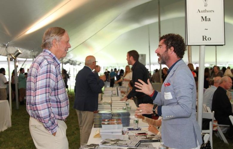 Former Governor of New York George Pataki speaking with authors
