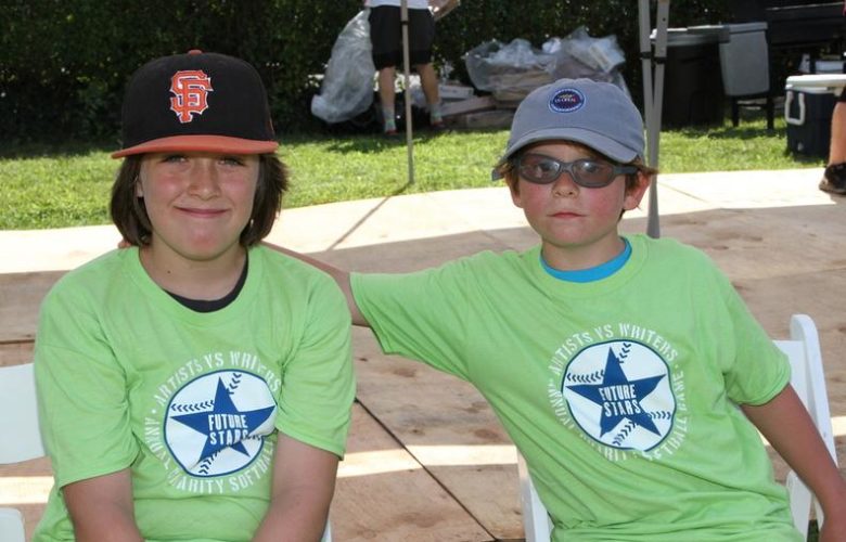 Noah age 9 and Isaac age 9, taking a Snapple water break after the kids clinic