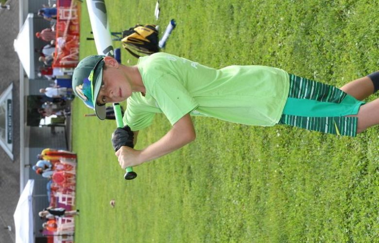 Coaches from Hamptons Baseball Camp instructed children with proper throwing, hitting and running techniques